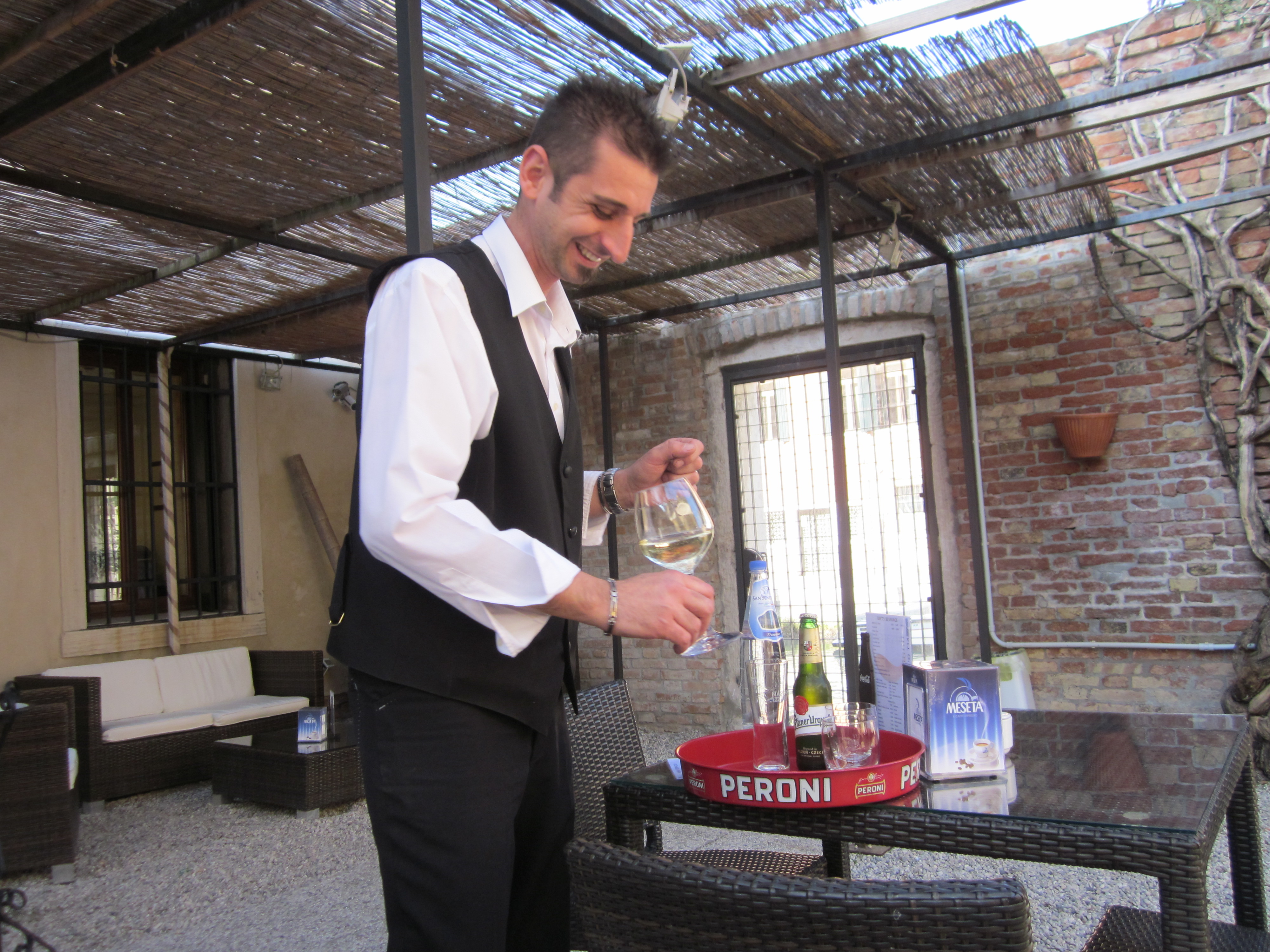 Our Waiter Pouring Prosecco