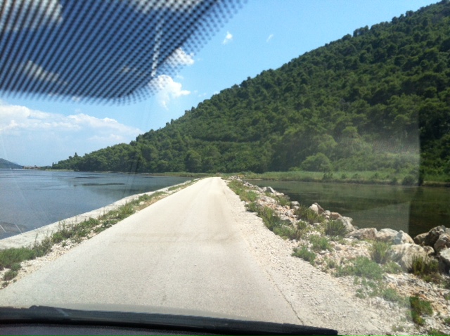 Road to Braca - Note the water on either side